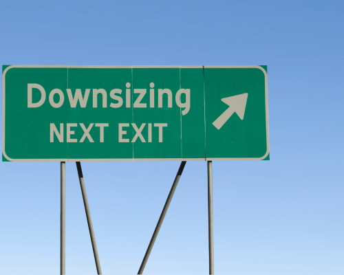 Road sign indicating the next exit for downsizing, symbolising a transition to a simpler life through a downsizer deposit bonds.