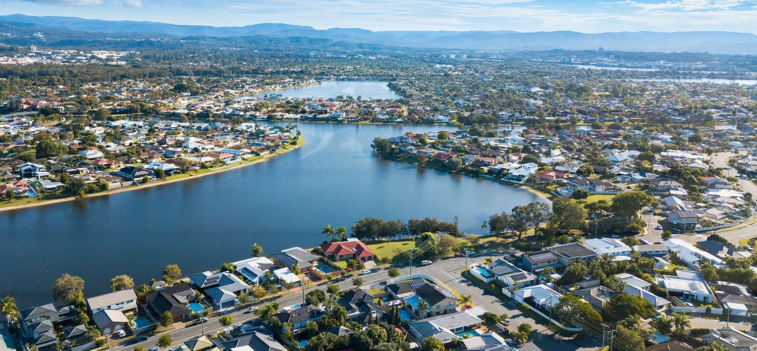 Burleigh Waters aerial showing lakeside homes surrounded by waterways and established suburbs
