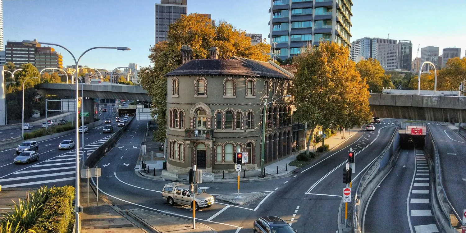 Heritage terrace homes near boutique/modern apartments in Melbourne's inner-city suburb, illustrating the value of heritage overlay protections for property investors.